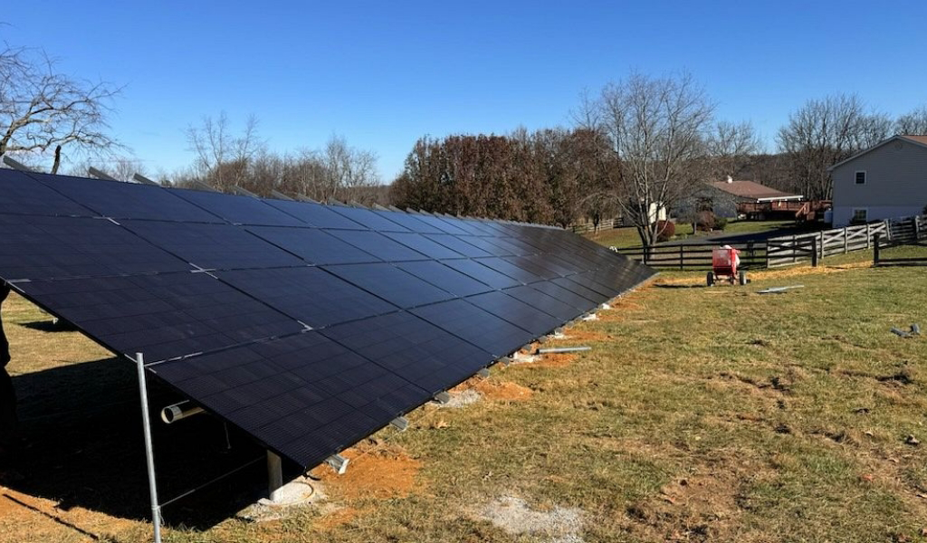 Ground mount solar panels installed on a residential rural property.